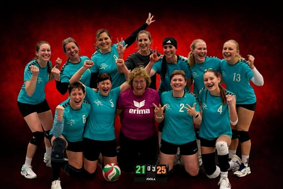 Rot-schwarzer Hintergrund hinter Volleyballteam